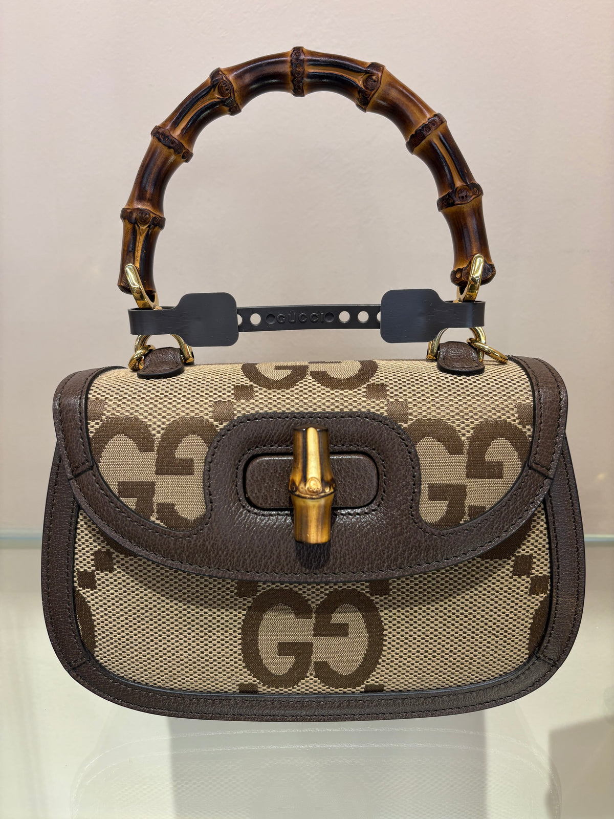 Gucci Borsa a mano Gucci Bamboo 1947 mini in tela Jumbo GG e pelle marrone. Nuovo