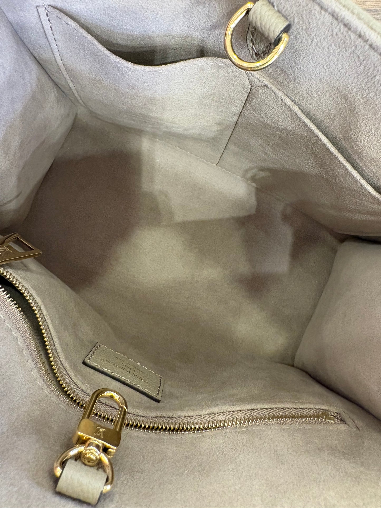 Louis Vuitton OnTheGo PM in pelle Monogram Empreinte