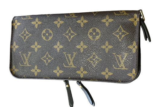 Louis Vuitton  Insolite portafoglio in tela monogam e pelle