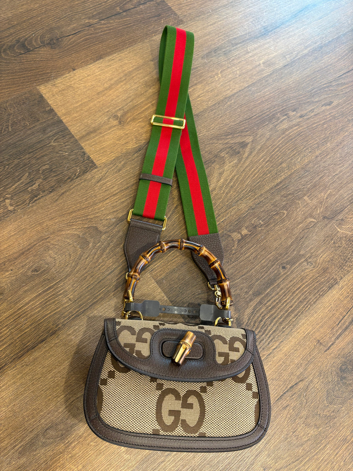 Gucci Borsa a mano Gucci Bamboo 1947 mini in tela Jumbo GG e pelle marrone. Nuovo