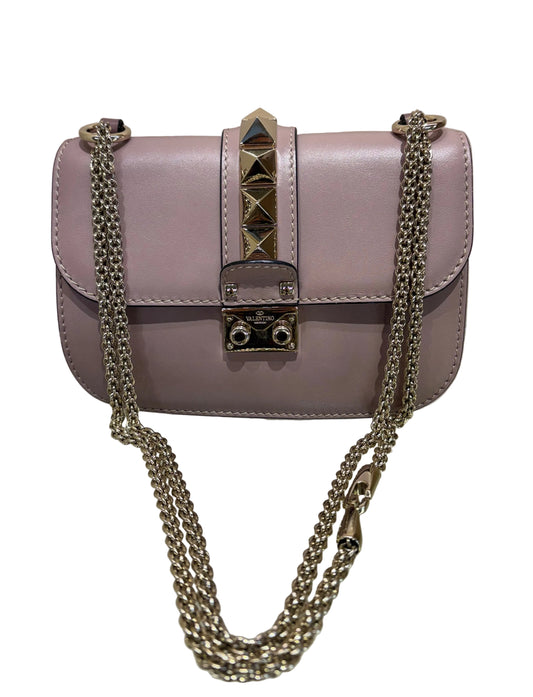 Valentino Garavani Borsa a tracolla  Glam Lock Medium in pelle rosa malva con borchie Rockstud