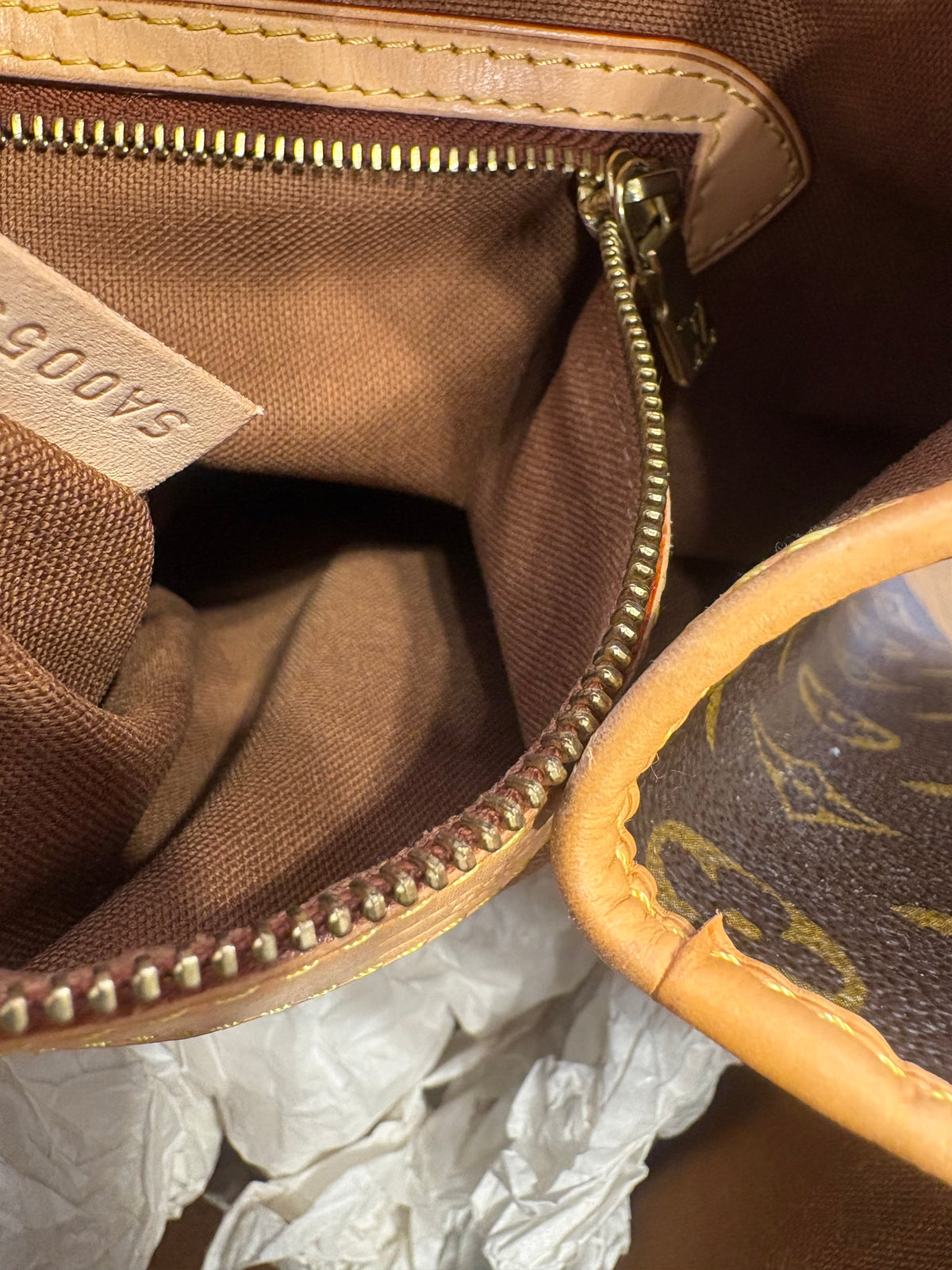 Louis Vuitton Batignolles Vertical in Tela Monogram e pelle