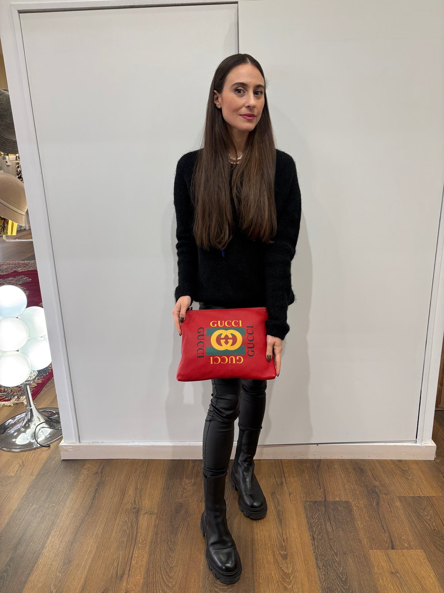 Gucci pochette in pelle con logo stampato