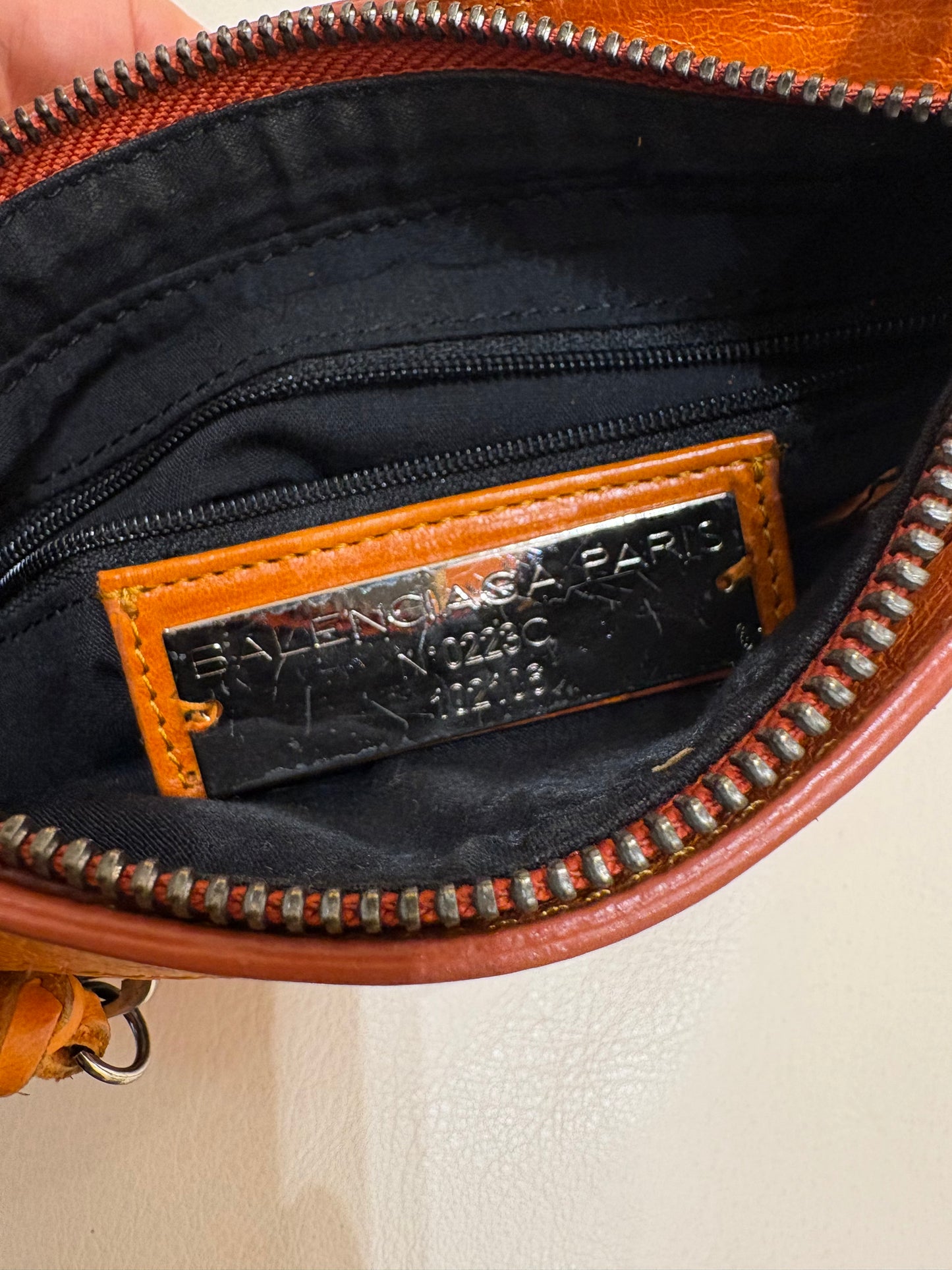 Balenciaga pochette in pelle arancione