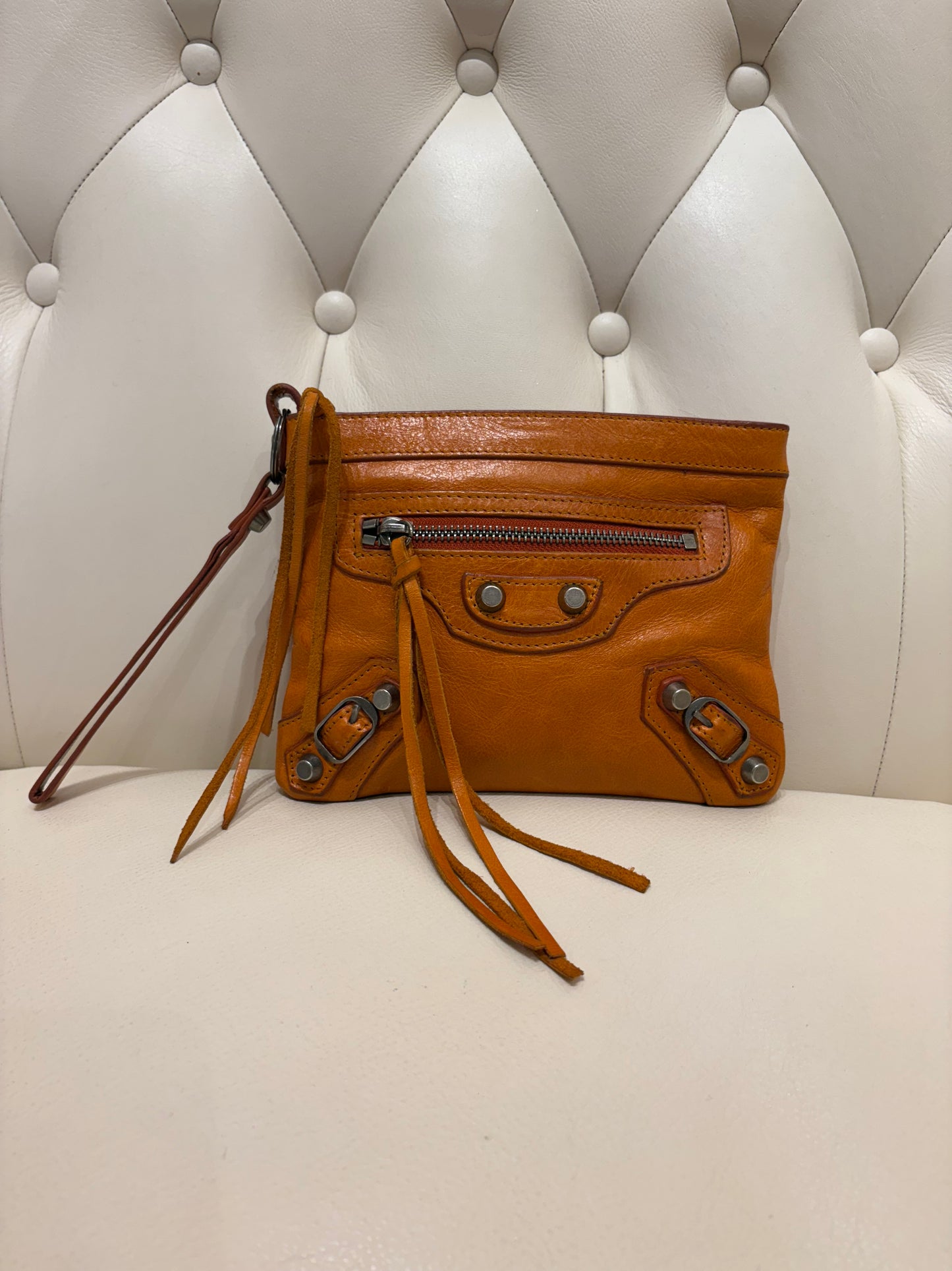Balenciaga pochette in pelle arancione