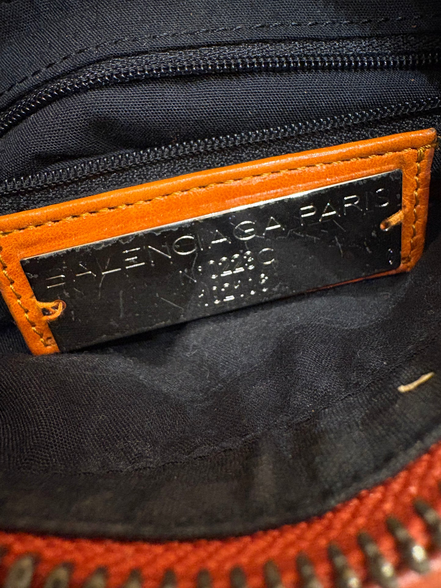 Balenciaga pochette in pelle arancione