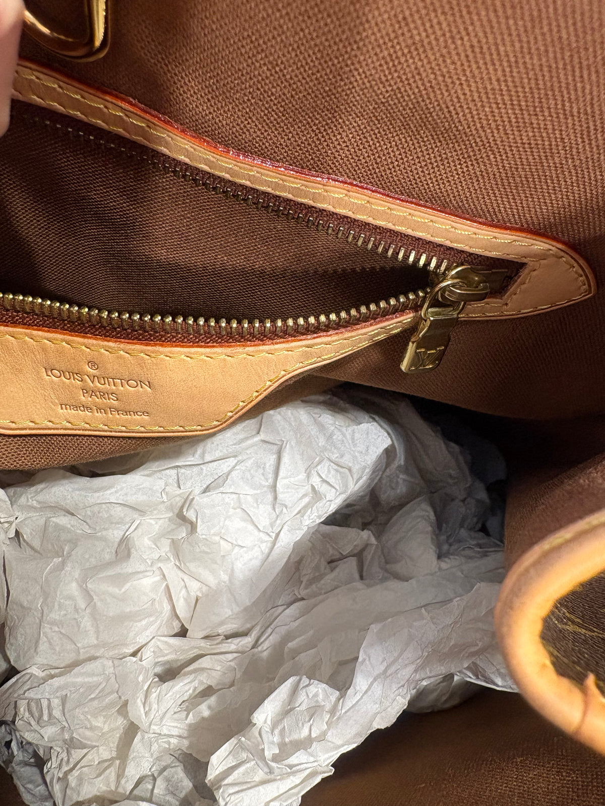 Louis Vuitton Batignolles Vertical in Tela Monogram e pelle