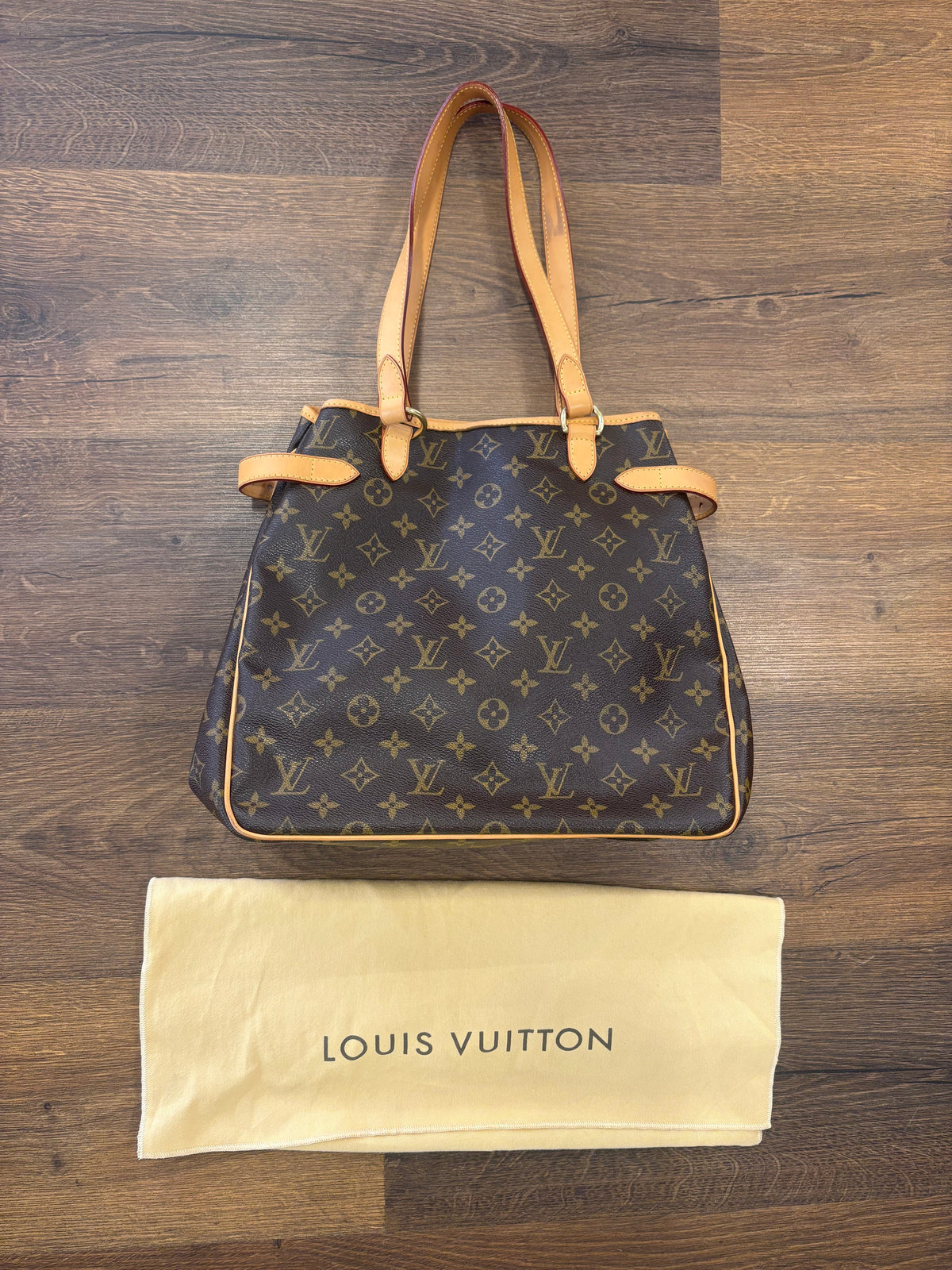 Louis Vuitton Batignolles Vertical in Tela Monogram e pelle