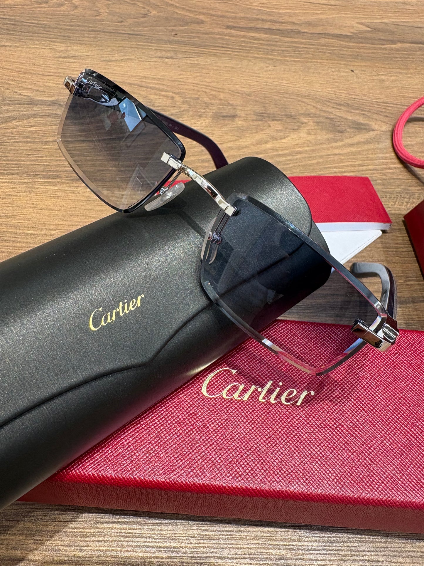 Occhiali da Sole Cartier Décor C - Modello CT0582S Rimless con Aste in Legno Pregiato.Nuovi