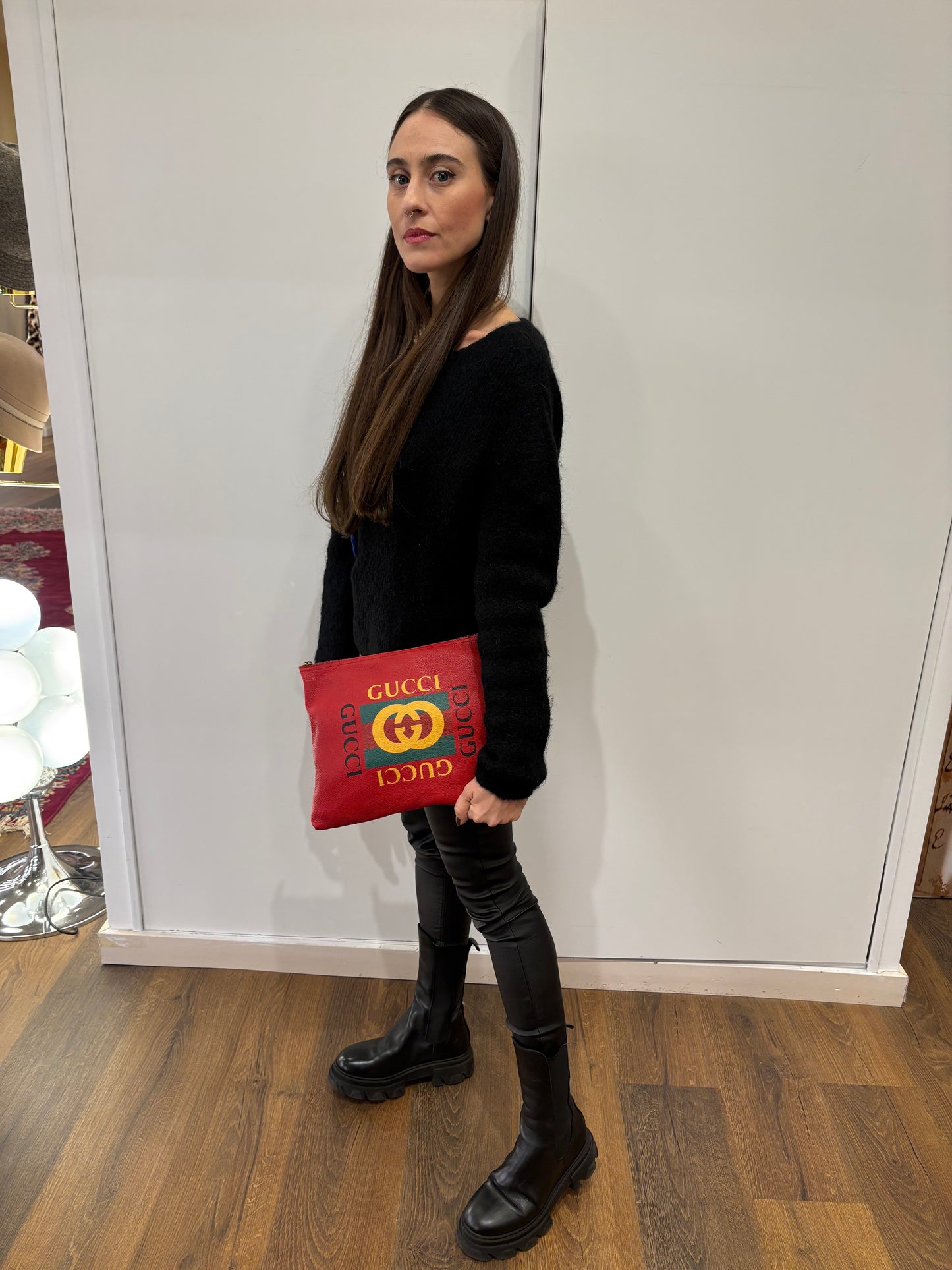 Gucci pochette in pelle con logo stampato