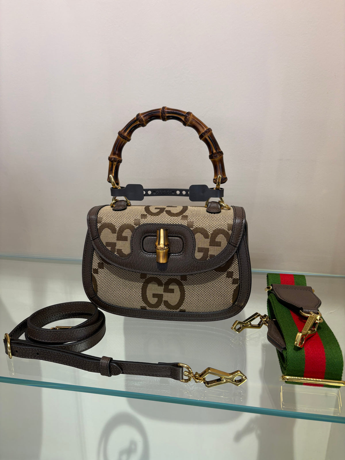 Gucci Borsa a mano Gucci Bamboo 1947 mini in tela Jumbo GG e pelle marrone. Nuovo