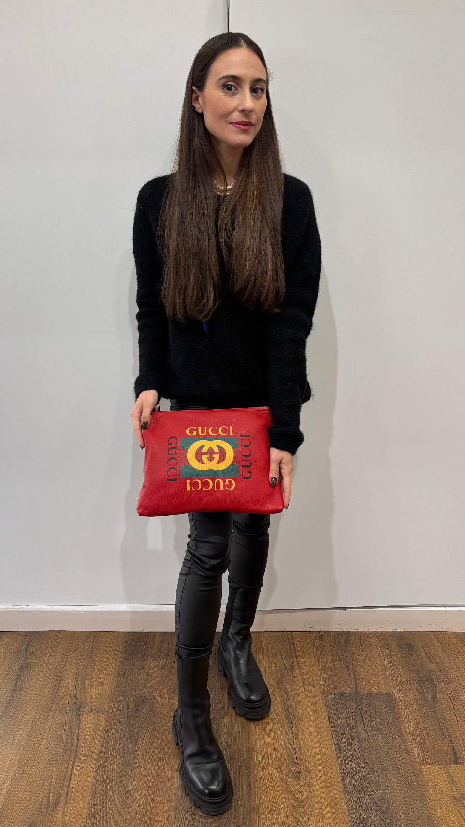 Gucci pochette in pelle con logo stampato