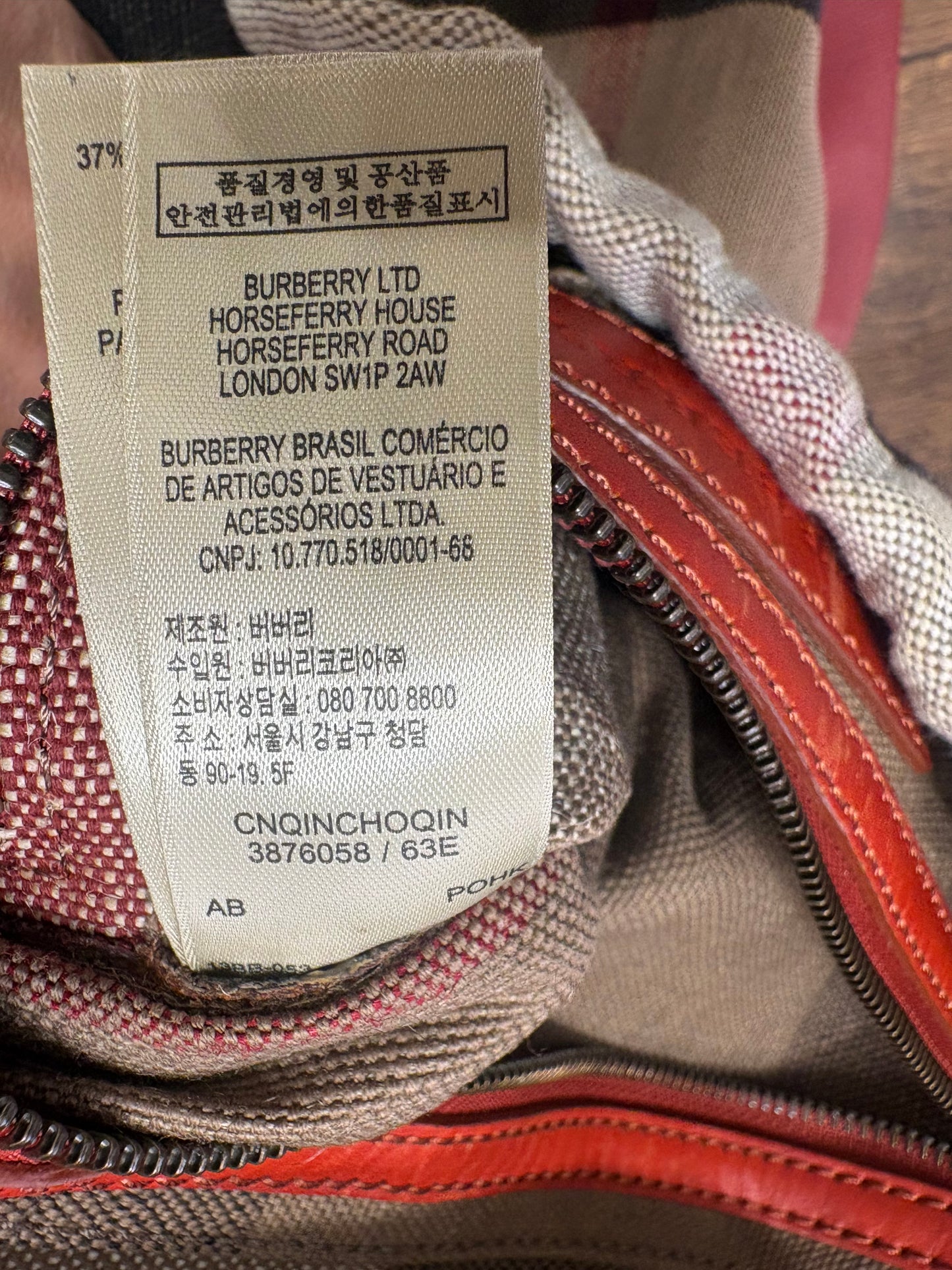 Burberry zaino tela check e pelle rossa