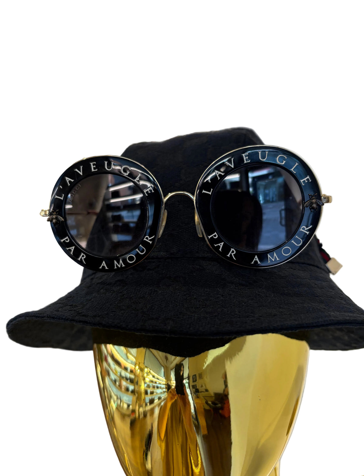 Gucci GG0113S "L'Aveugle Par Amour" Occhiali da Sole Rotondi Nero e Oro