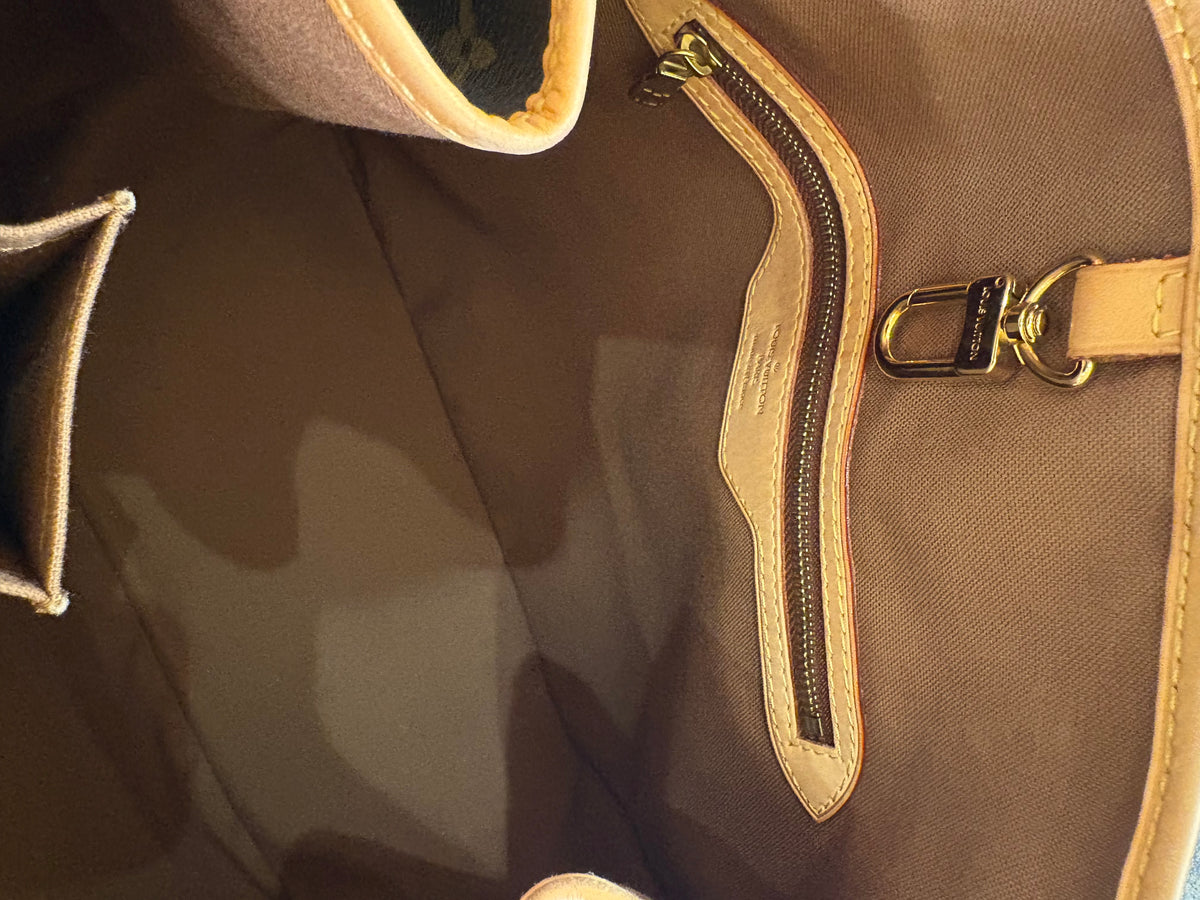 Louis Vuitton Batignolles Vertical in Tela Monogram e pelle