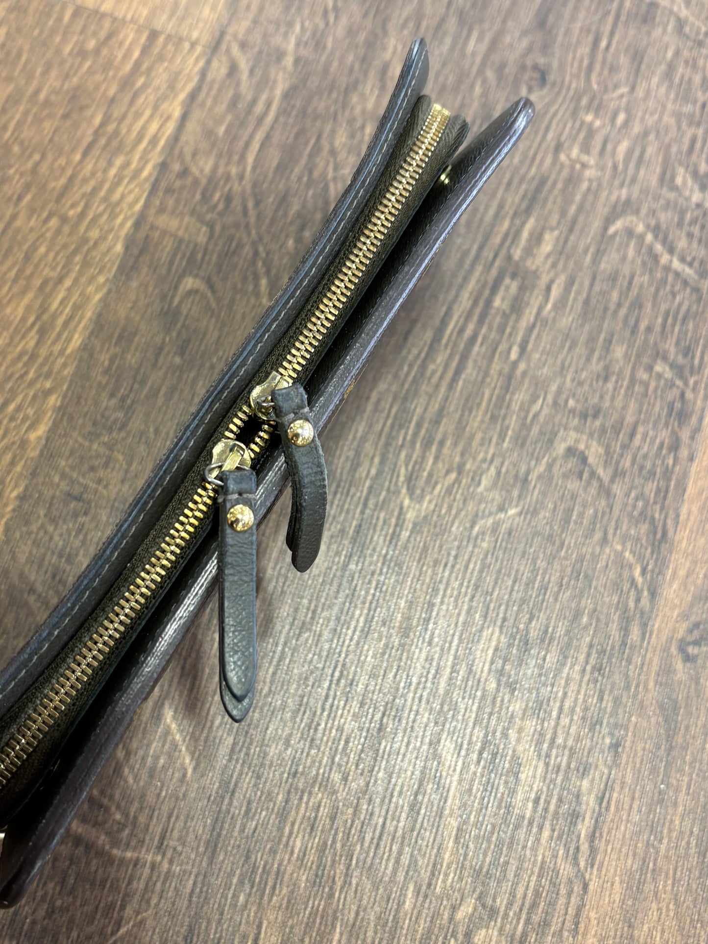 Louis Vuitton  Insolite portafoglio in tela monogam e pelle