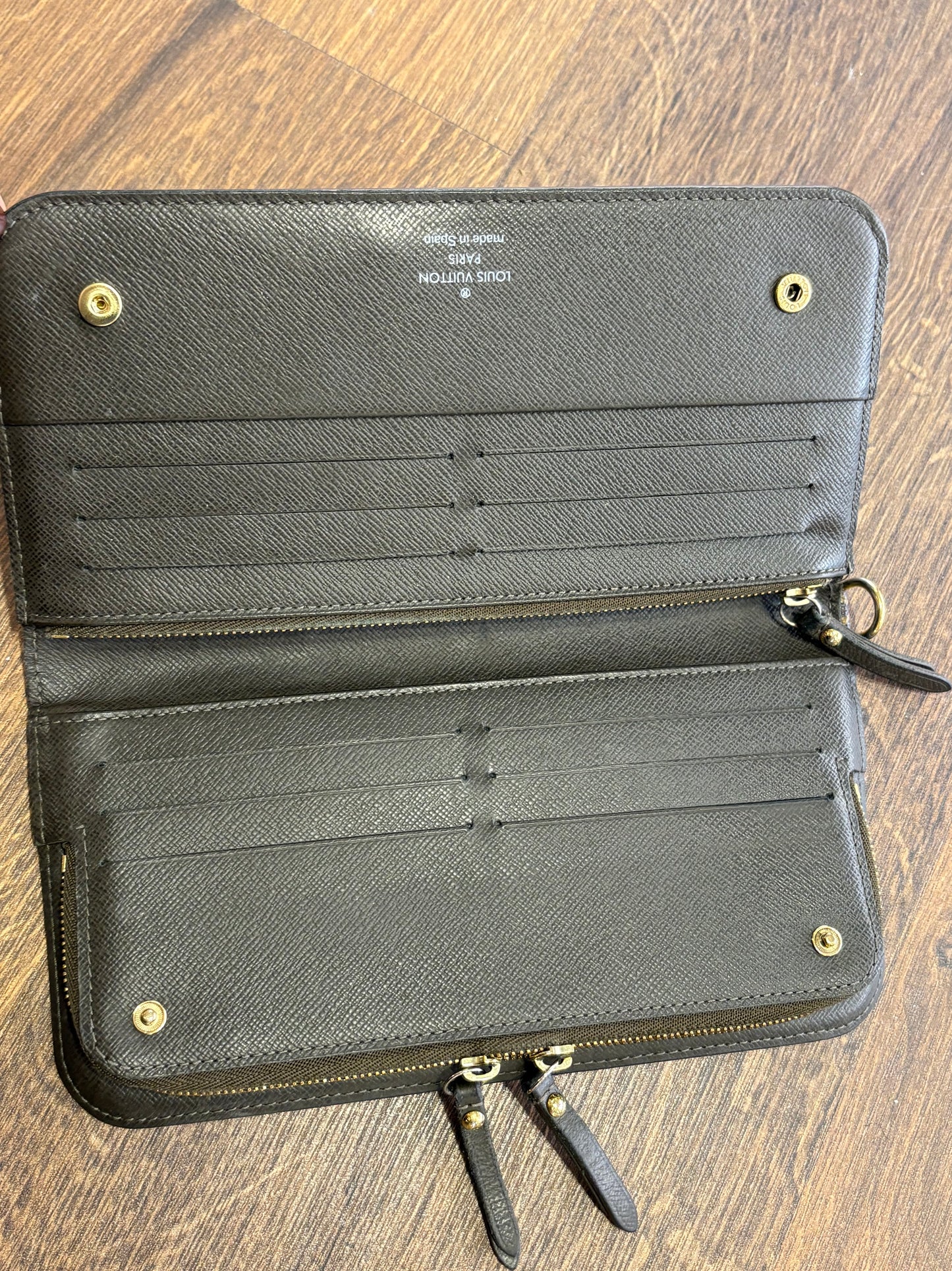 Louis Vuitton  Insolite portafoglio in tela monogam e pelle