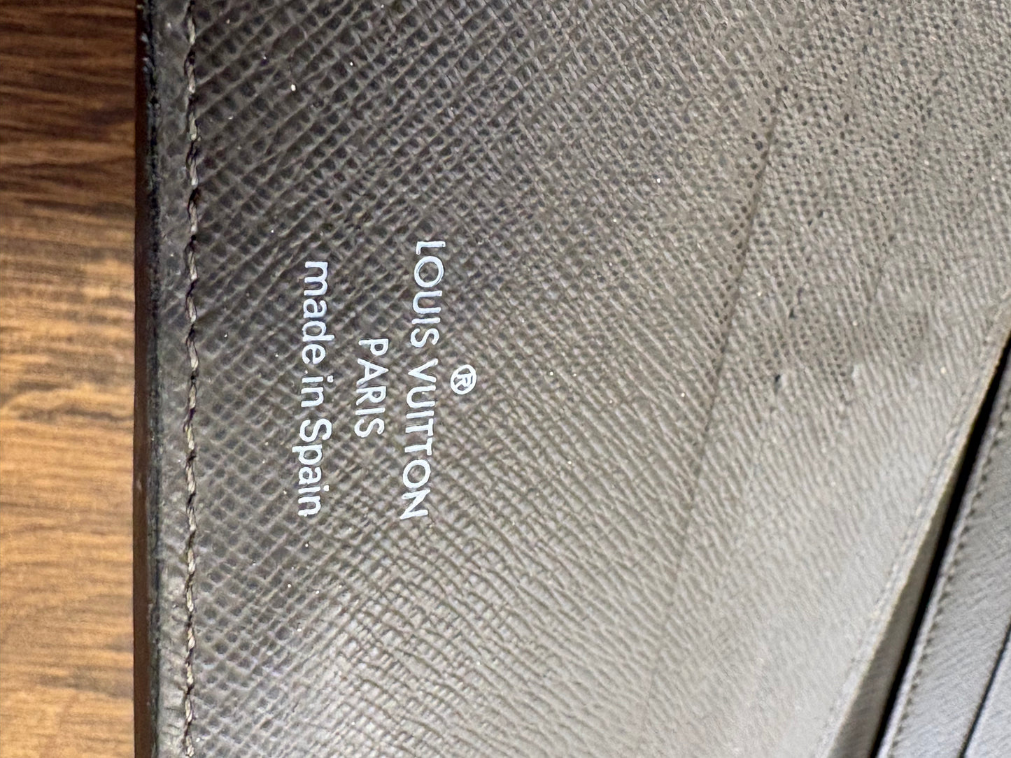 Louis Vuitton  Insolite portafoglio in tela monogam e pelle