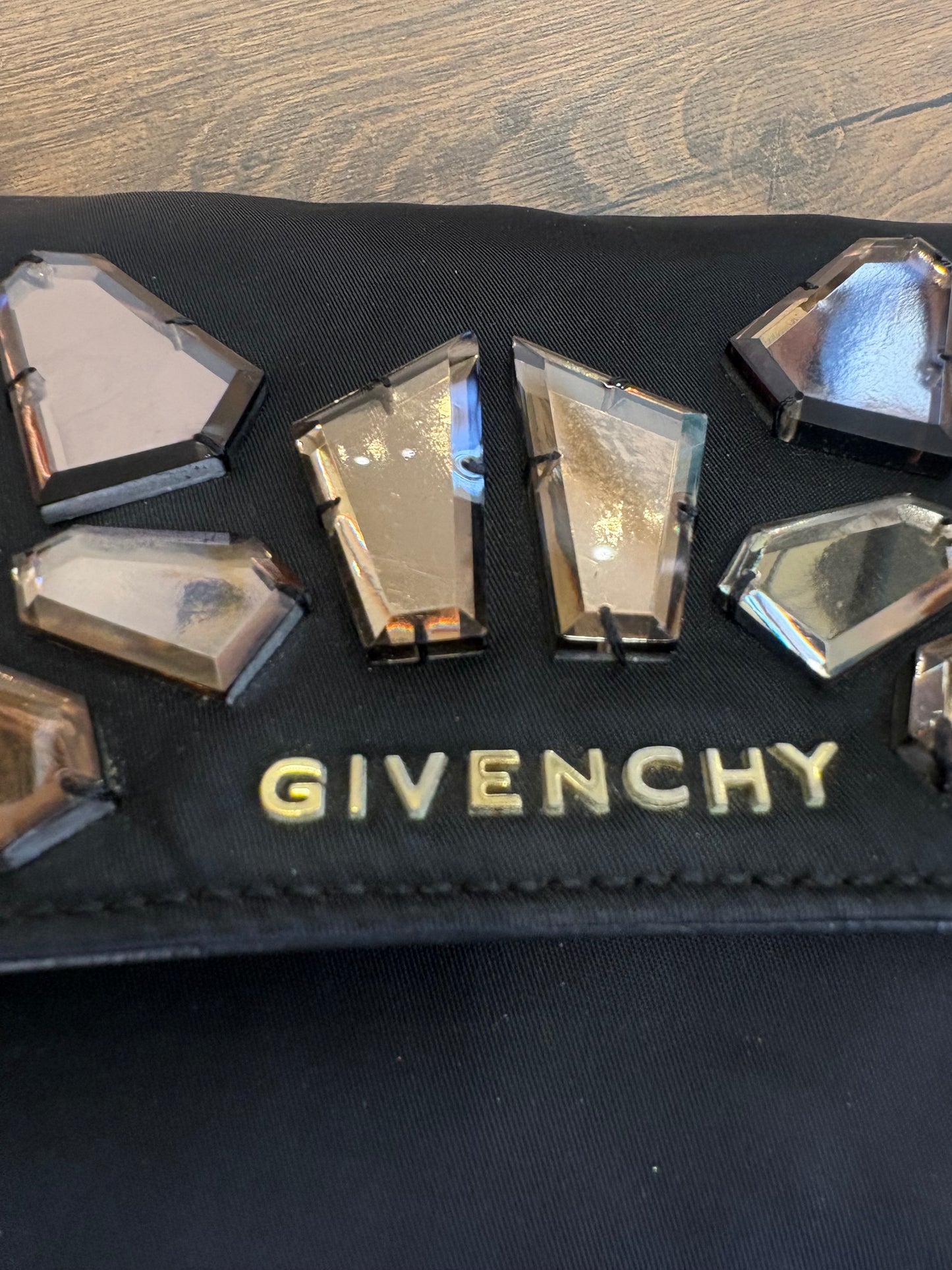 Givenchy pochette nylon e specchietti ambrati