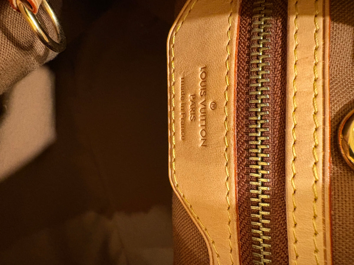 Louis Vuitton Batignolles Vertical in Tela Monogram e pelle