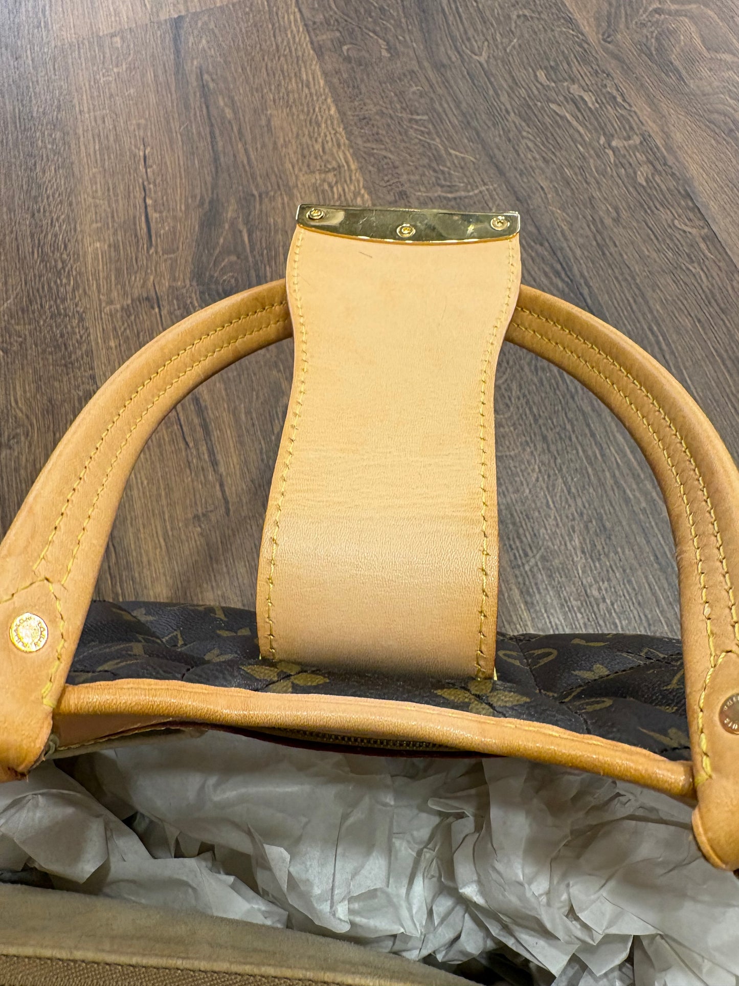 Louis Vuitton Etoile Shopper in tel Monogram trapuntata con finiture in pelle