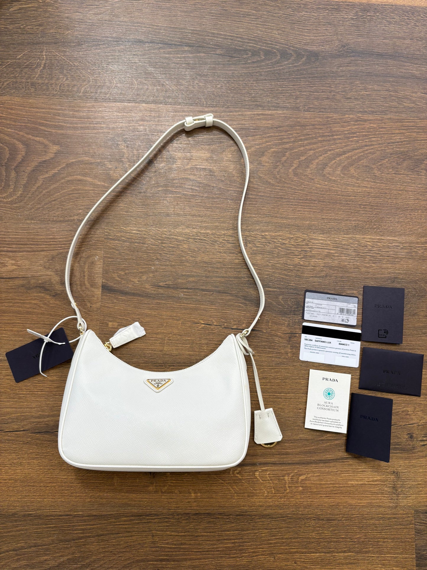 Borsa Prada Re-Edition 2005 in Pelle Saffiano Bianco. Nuovo