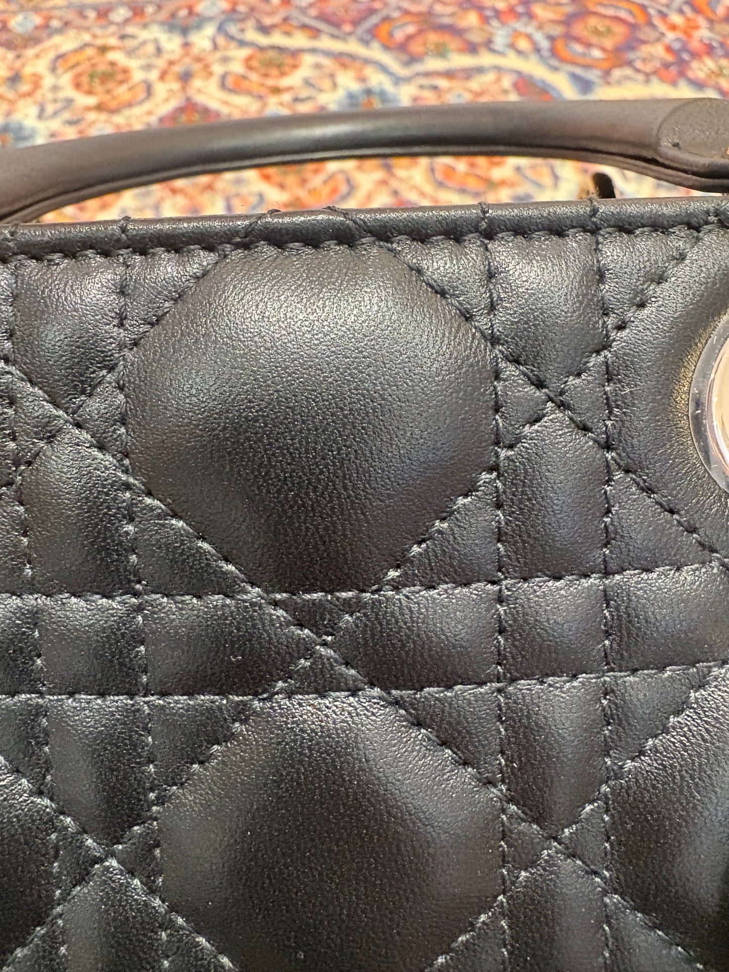 Lady Dior misura small  in agnello cannage nero