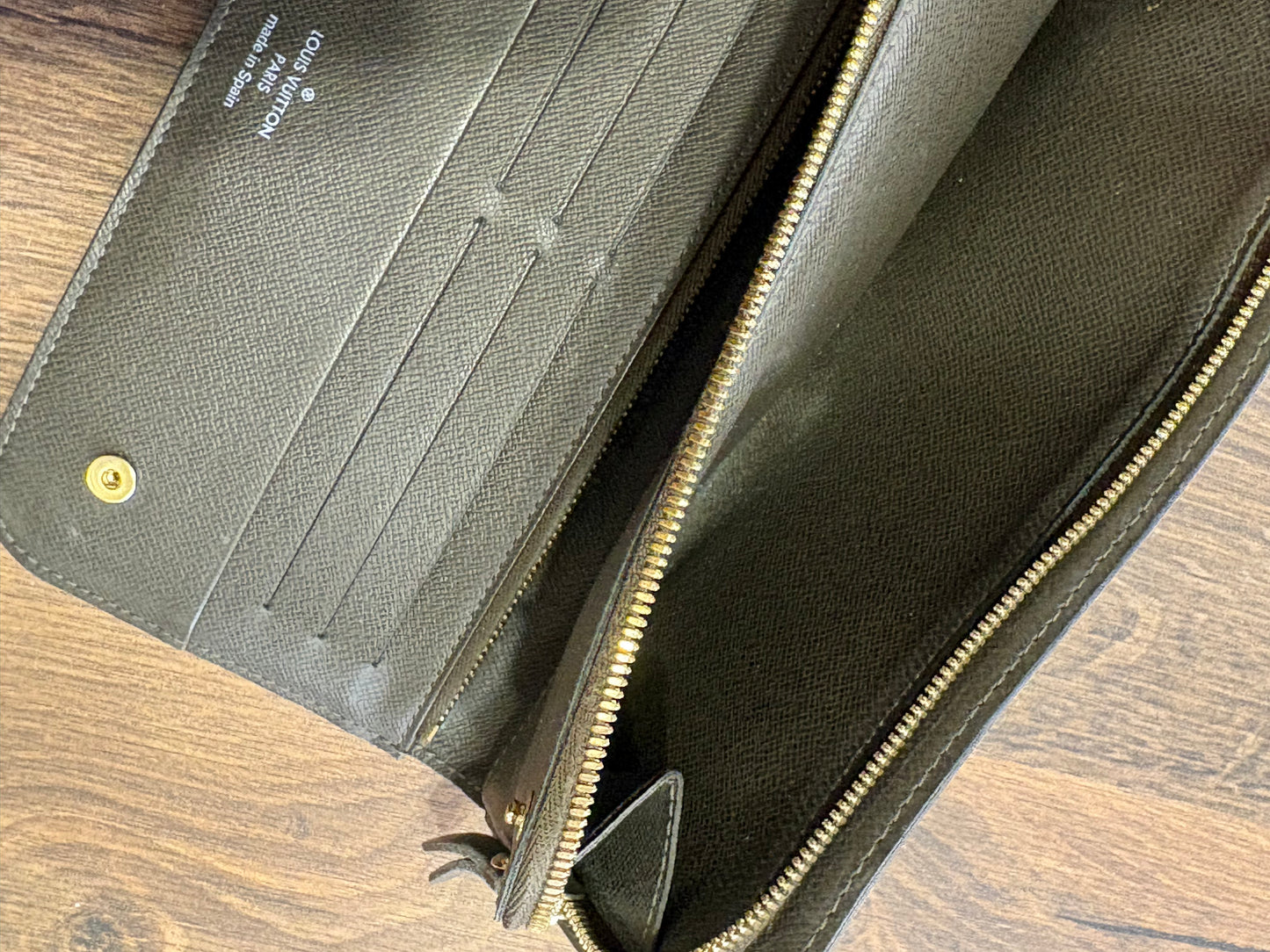 Louis Vuitton  Insolite portafoglio in tela monogam e pelle